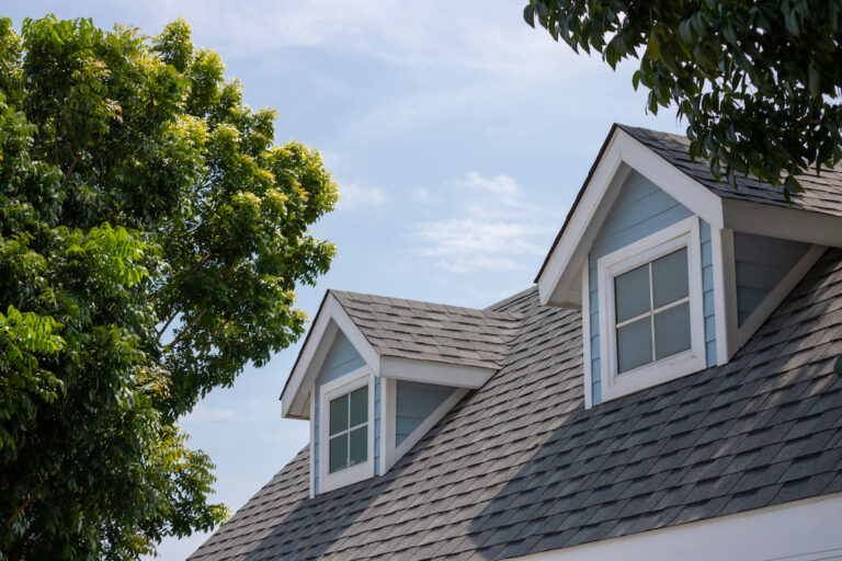 Shingle roof with dormer windows
